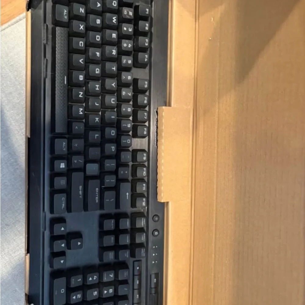 Corsair Yellow and Black Keyboard Gamer keyboard new never used.